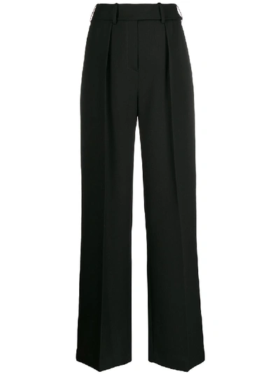 Alexandre Vauthier Metallic Stretch-knit Tapered Pants In Black
