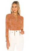 Free People Lela Floral Smocked Ruffle Blouse In Coral Combo