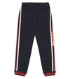 GUCCI LOGO-TAPED COTTON TRACKPANTS,P00398340