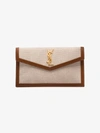 Saint Laurent Uptown Monogram Clutch In Neutrals