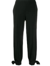 MOSCHINO TIED ANKLE TROUSERS