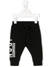 Dsquared2 Icon Tapered Cotton Track Pants In Black