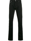ALEXANDER MCQUEEN DRAGON PATCH TAPERED JEANS