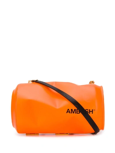 Ambush 罐头logo印花手拿包 In Orange