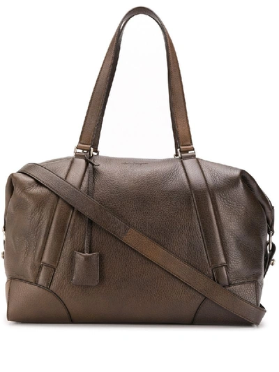 Ferragamo Logo Embossed Holdall In Brown