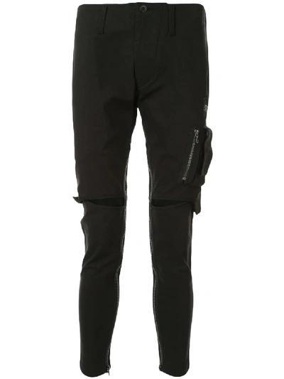 Julius Distressed Skinny Trousers In Black