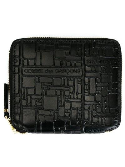 Comme Des Garçons Logo Embossed Wallet In Black