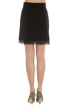 Dolce & Gabbana Chantilly Lace-trimmed Stretch-wool Mini Skirt In Black