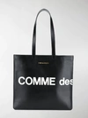 Comme Des Garçons Logo Print Tote In Schwarz
