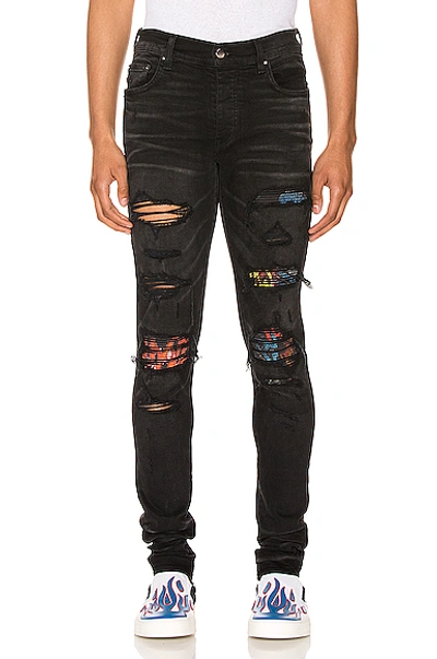 Amiri 15cm Tapered Mx1 Animation Denim Jeans In Black