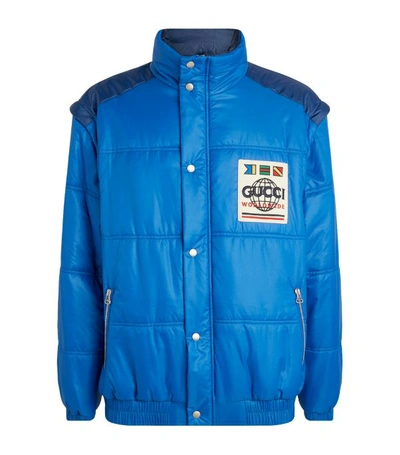 Gucci Worldwide Logo Detachable-sleeve Puffer Jacket In Blue