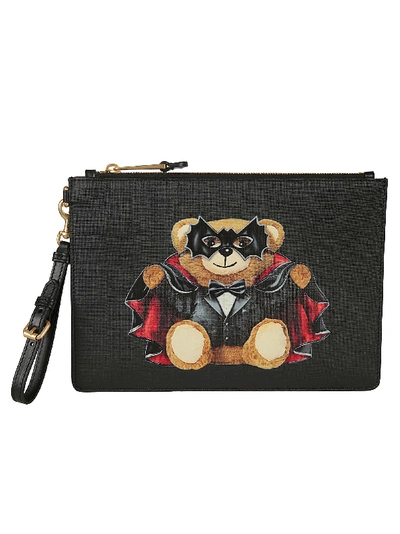 Moschino Graphic Printed Clutch Bag In Black
