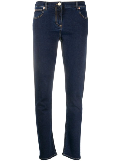 Valentino Studded Mid-rise Slim-leg Jeans In Blue