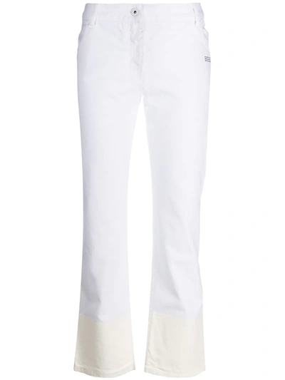 OFF-WHITE CONTRAST HEM MID-RISE JEANS