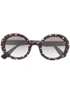 MIU MIU CIRCLE FRAME STAR PRINT SUNGLASSES