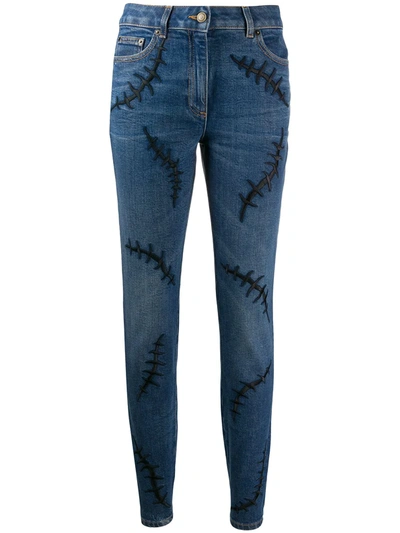 Moschino Embroidered Stitch Mid-rise Jeans In Light Blue