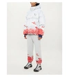 UNDERCOVER Graphic-print shell-down puffer jacket