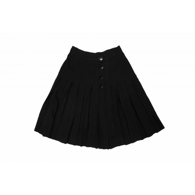 Pre-owned Saint Laurent Wool Mini Skirt In Black