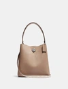 COACH CHARLIE BUCKET BAG 21 IN BLOCKED SIGNATURE CANVAS,89101 LHPVT