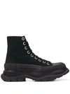 Alexander Mcqueen Leather And Rubber Exaggerated-sole Ankle Boots In Black