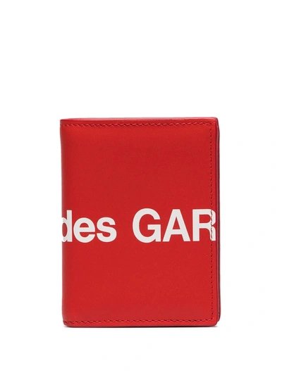Comme Des Garçons Large Logo Print Wallet In Red