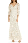 Carmen Marc Valvo Infusion Floral Applique Trumpet Gown In Champagne