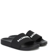 Balenciaga Logo-embossed Rubber Slides In Black White