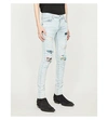 AMIRI TIE-DYE UNDERLAY SKINNY STRETCH-DENIM JEANS