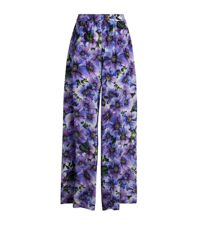 Dolce & Gabbana All-over Floral Printed Trousers In Viola