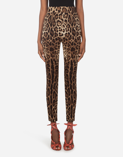 DOLCE & GABBANA LEGGINGS IN CHARMEUSE WITH LEOPARD PRINT