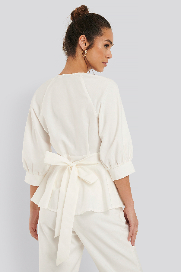 white belted blouse