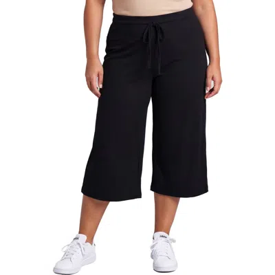 24seven Comfort Apparel Curvy Basic Ribbed Knit Drawstring Flared Capri Pants In Black