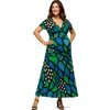 24seven Comfort Apparel Maternity Blue Butterfly Print V-neck Empire Waist Cap Sleeve Maxi Dress In Green