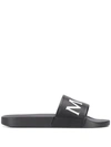 Moncler Bastien Logo Leather Slide Sandals In Black