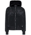 Nike Jordan Reversible Faux Fur Bomber Jacket In Black