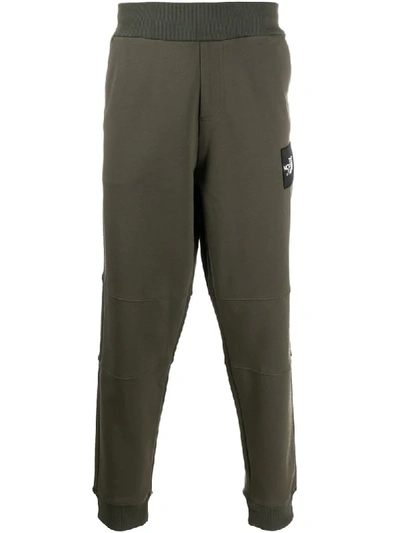 The North Face Logo Patch Track Trousers In Green