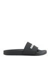 Balenciaga Logo-embossed Rubber Slides In Black