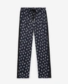 THE KOOPLES SPORT FLOWING PRINTED TROUSERS WITH BLUE LOGO TRIM