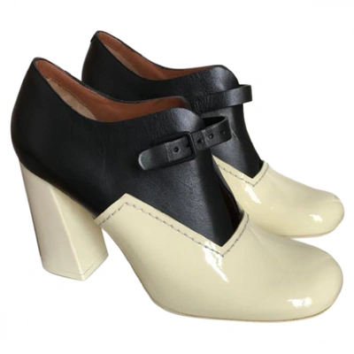 Pre-owned Celine Leather Ankle Boots In Ecru