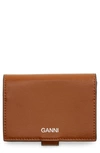Ganni Bifold Textured Leather Wallet In Cognac