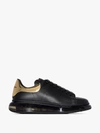 ALEXANDER MCQUEEN BLACK AND GOLD OVERSIZED SNEAKERS,610812WHX9X14607025