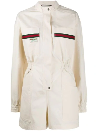Gucci Logo-label Long-sleeved Playsuit In Neutrals