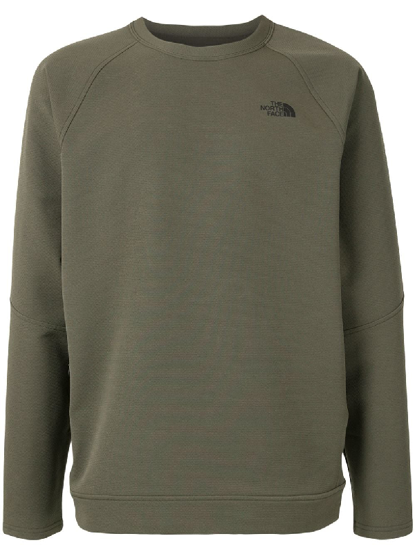 green north face jumper