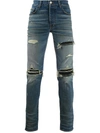 Amiri Slim Fit Ripped Jeans In Blue