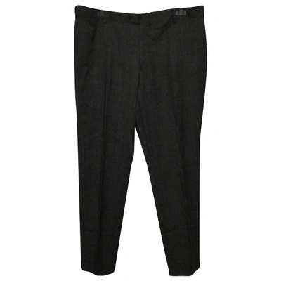 Pre-owned Calvin Klein Wool Trousers In Grey