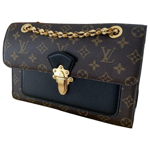 Pre-Owned Louis Vuitton Victoire Brown Cloth Handbag | ModeSens