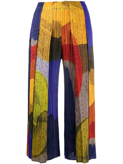 Issey Miyake Cropped Pleated Abstract Print Trousers In Yellow