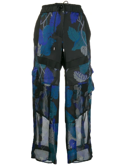 Sacai Floral Print Patchwork Trousers In Black