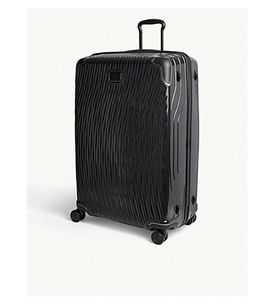 Tumi Latitude Worldwide Suitcase In Silver