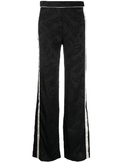 Neil Barrett Side Stripe Jacquard Detail Trousers In Black